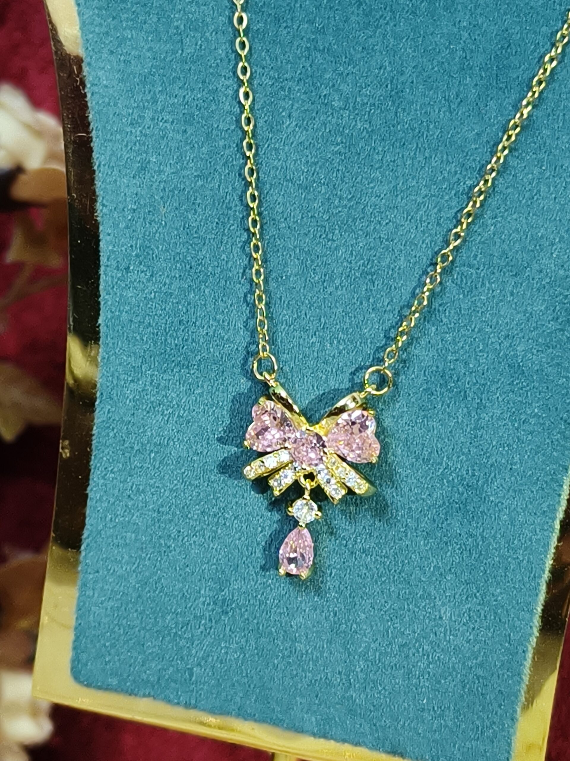 Blush Bow Dangle Pendant 199